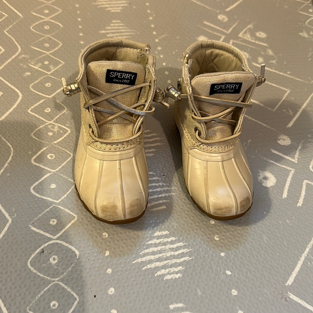 Sperry off white duck boots. Used with scuffs as shown.
